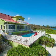 Parrot-ise 4 Bedroom Oceanfront Villa in Cayman Kai