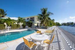 Snug Harbour View #8 – 2BR/2BA Canal Front Condo by Seven Mile Beach