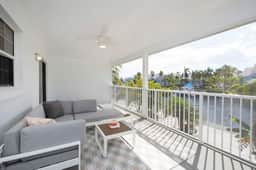 Snug Harbour View #9 – 2BR/2BA Canal Front Condo by Seven Mile Beach