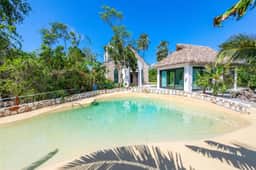 The Mastic Cottage Collection | 7BR Estate on North Side