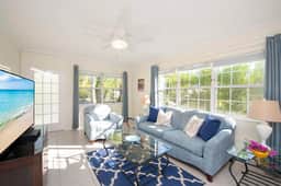 Snug Harbour View #1 – 1BR Canal‑Front Condo by Seven Mile Beach - Image 4