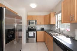 Snug Harbour View #6 – 1BR Canal Front Condo by Seven Mile Beach - Image 4