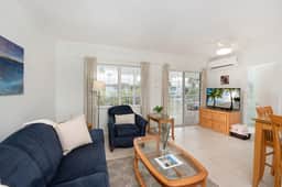 Snug Harbour View #8 – 2BR/2BA Canal Front Condo by Seven Mile Beach - Image 3
