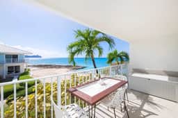 Grape Tree #10 - Luxe 2BR Ocean View Condo on Seven Mile Beach - Image 2