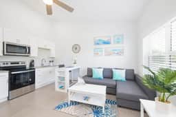 Summertime Suites #49 – Cozy 1BR West Bay Retreat with Pool - Image 5