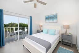 Summertime Suites #49 – Cozy 1BR West Bay Retreat with Pool - Image 4