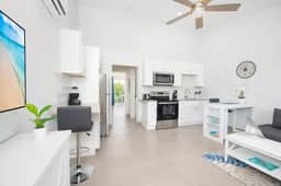 Summertime Suites #49 – Cozy 1BR West Bay Retreat with Pool - Image 3