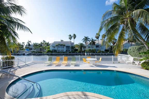 Snug Harbour View #5 – 1BR Canal Front Condo by Seven Mile Beach