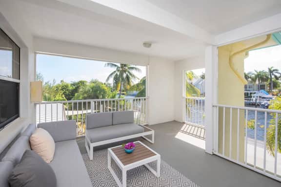 Snug Harbour View #7 – 2BR Canal Front Condo by Seven Mile Beach