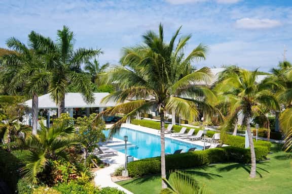 Summertime Suites #49 – Cozy 1BR West Bay Retreat with Pool