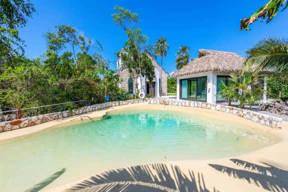 The Mastic Cottage Collection | 7BR Estate on North Side