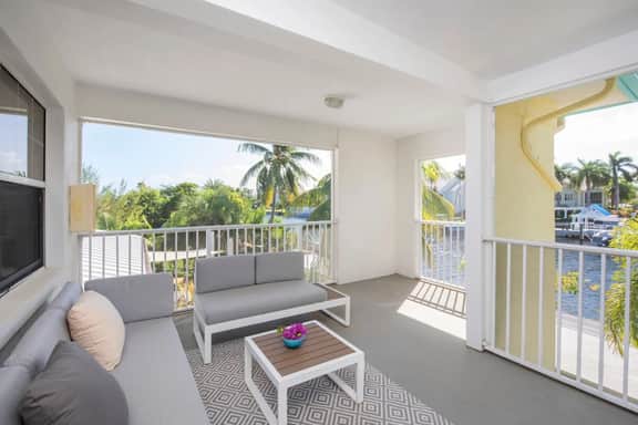 Snug Harbour View #7 – 2BR Canal Front Condo by Seven Mile Beach - Image 4