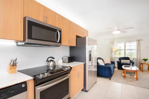 Snug Harbour View #8 – 2BR/2BA Canal Front Condo by Seven Mile Beach - Image 4