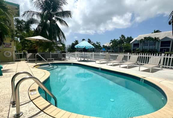 Snug Harbour View #8 – 2BR/2BA Canal Front Condo by Seven Mile Beach - Image 2