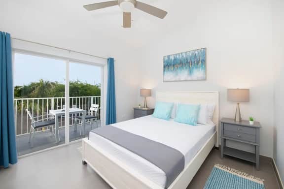 Summertime Suites #49 – Cozy 1BR West Bay Retreat with Pool - Image 4