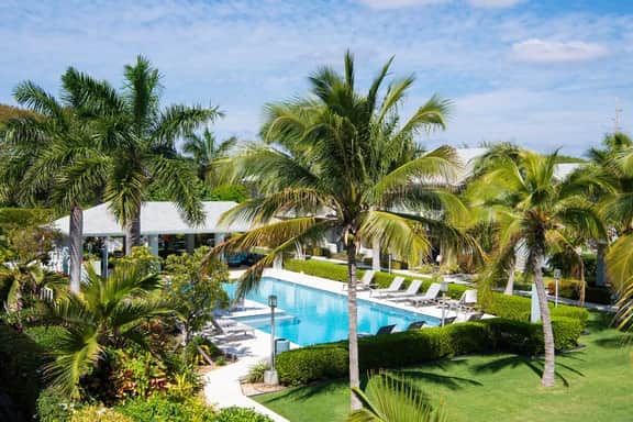 Summertime Suites #49 – Cozy 1BR West Bay Retreat with Pool - Image 2