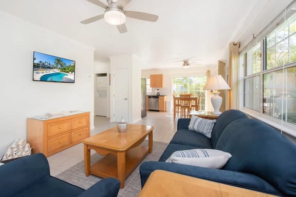 Snug Harbour View #6 – 1BR Canal Front Condo by Seven Mile Beach - Image 1